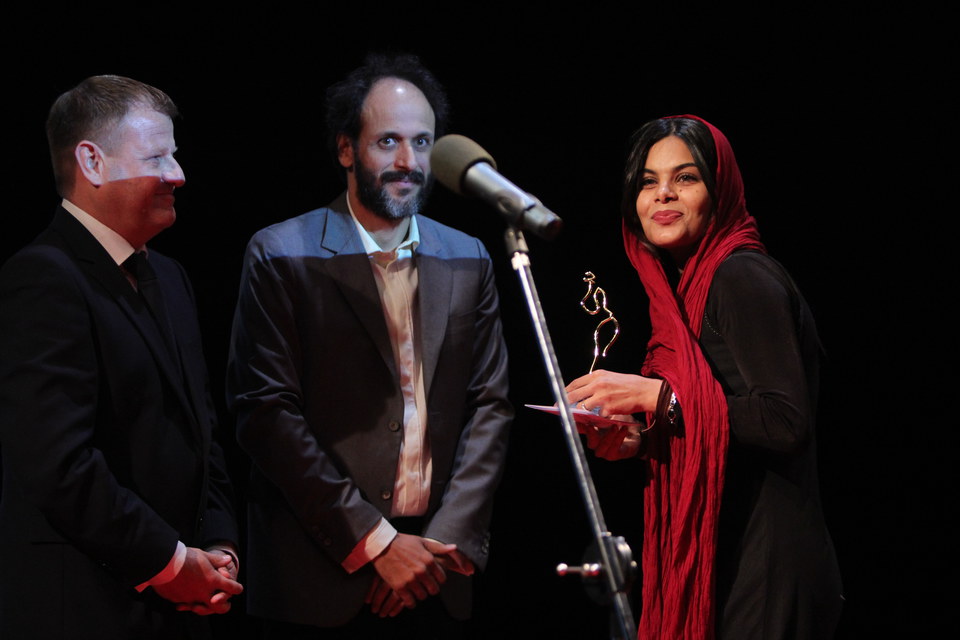 Actress Tima Amiri taking the Special Jury Prize Feature Film “MANDOO”, in the absence of the director