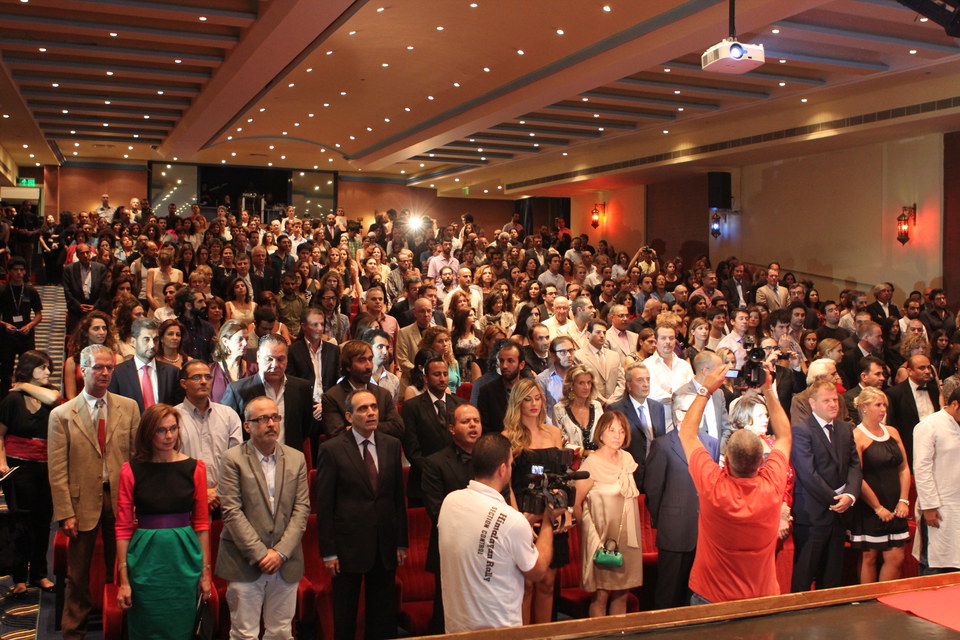 The ceremony commences by singing the National Anthem