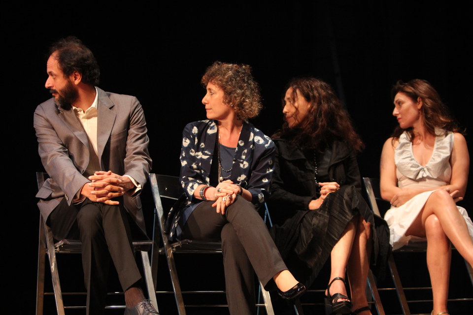 Jury members watching the announcement of the next prize