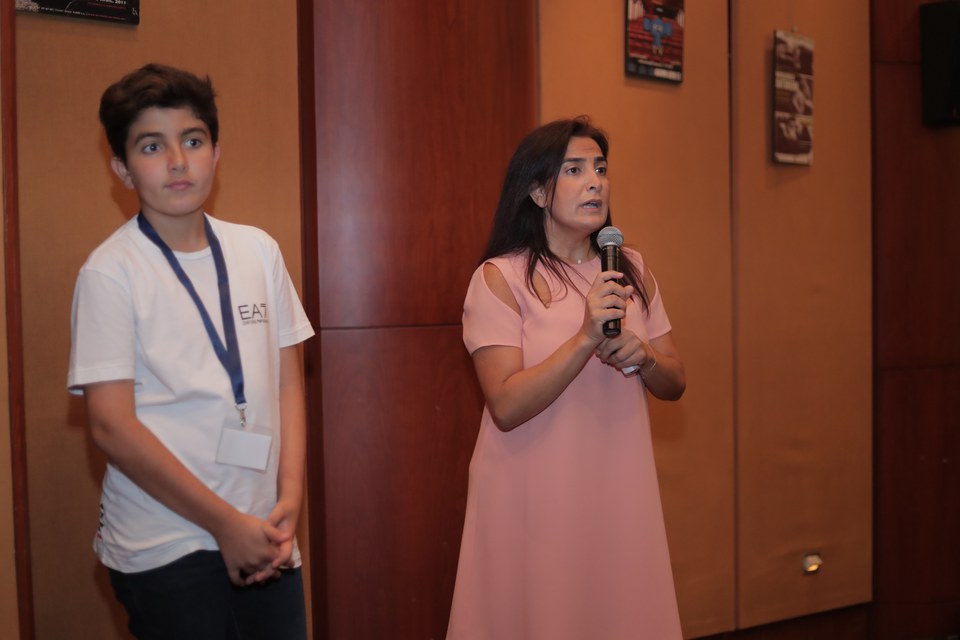 Diana Moukalled again with her son