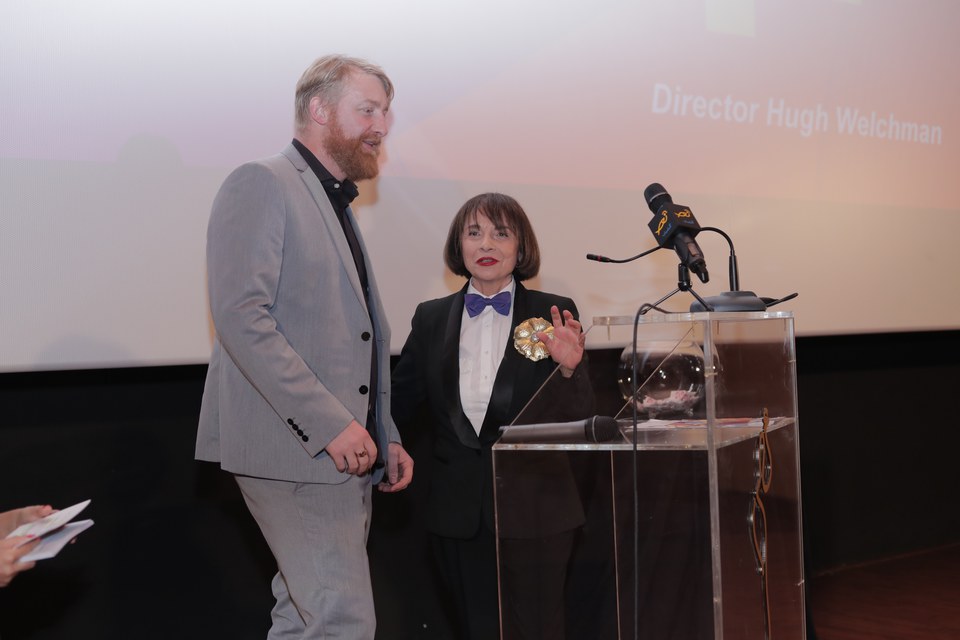 Colette Naufal presenting Director of Loving Vincent, Hugh Welchman